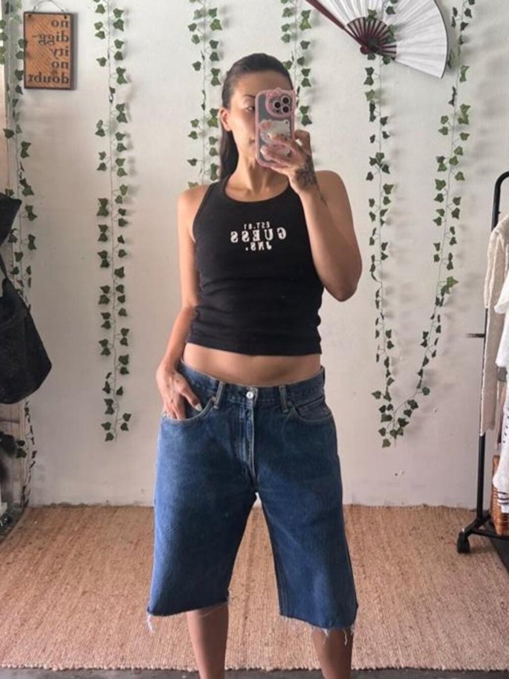 Vintage Levi's dark wash denim jorts made from cut-off jeans